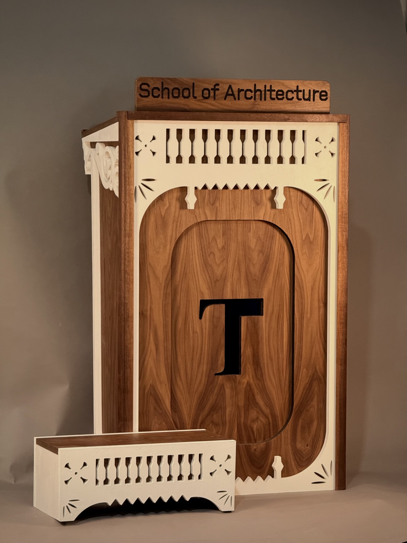 Walnut and white lectern with the Tulane T