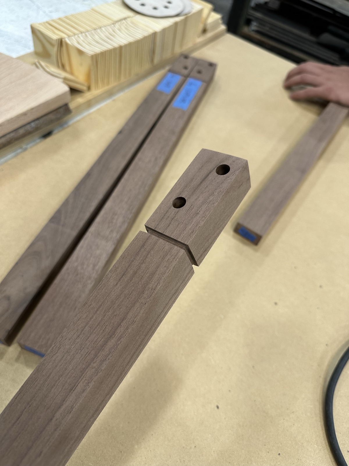 Walnut leg with a notched joint and drilled pin holes
