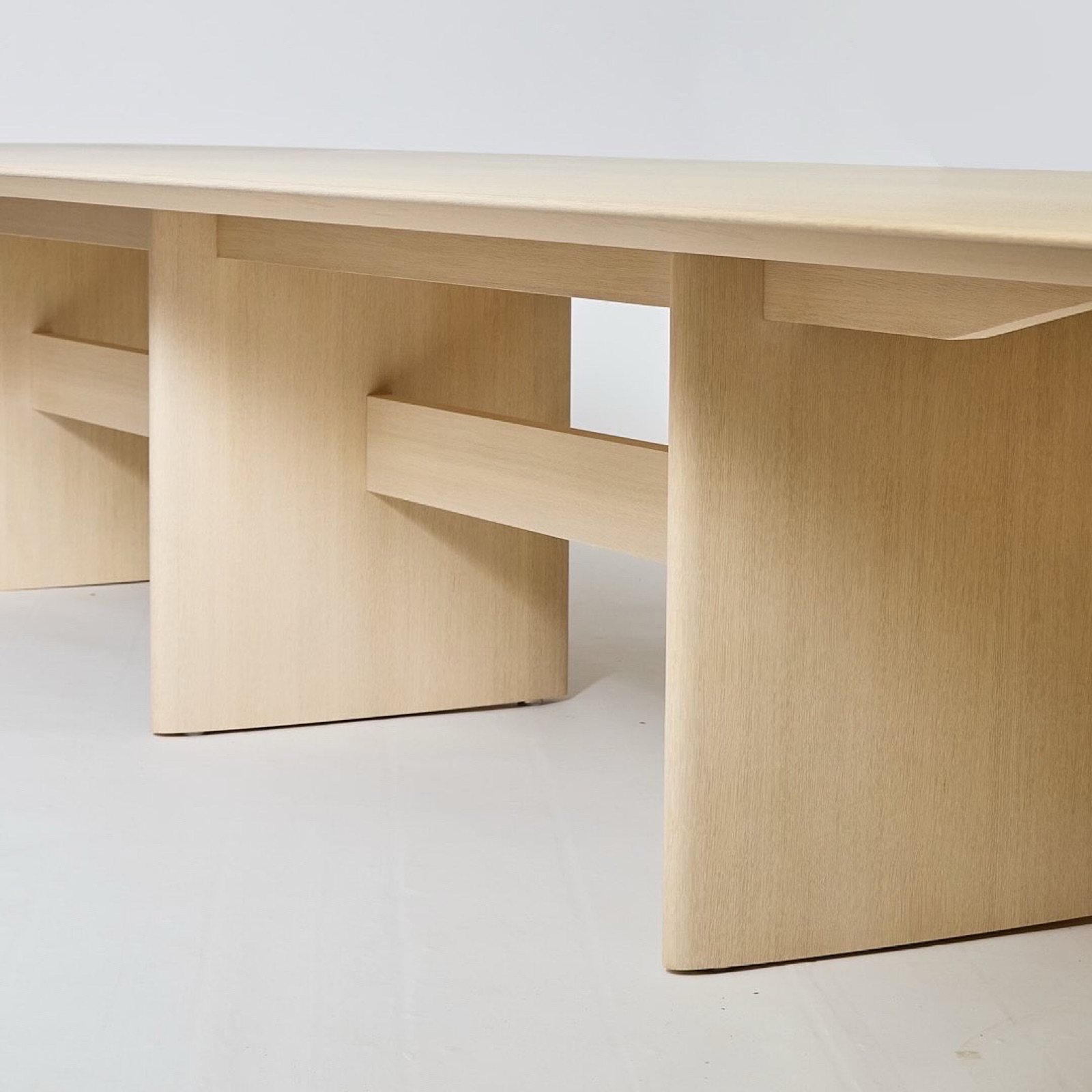 Panel legs and stretcher of the conference table