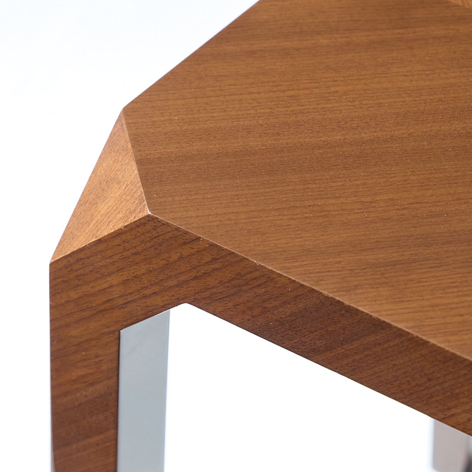 Faceted corner of a side table